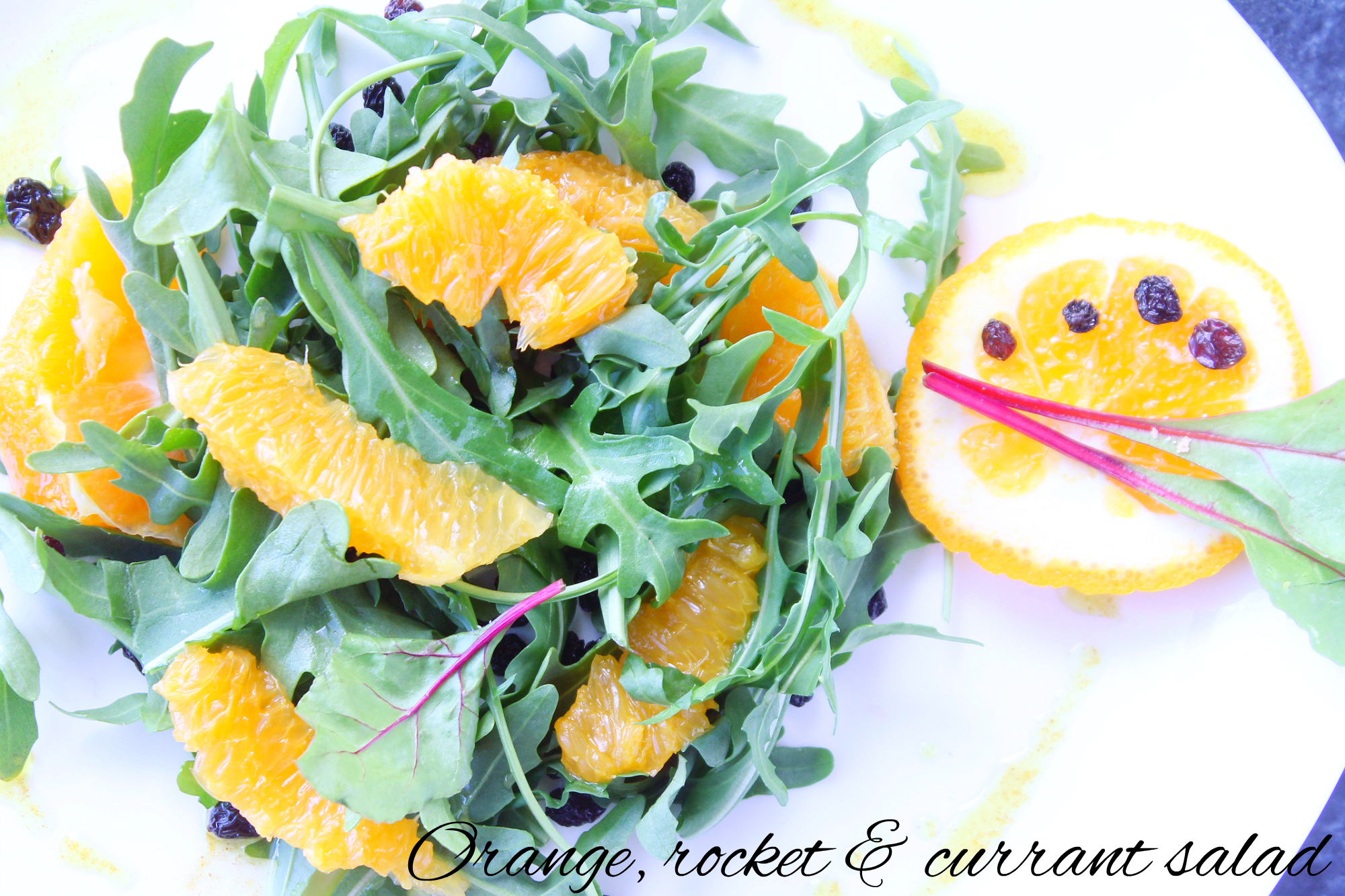 Orange, rocket and currant salad